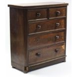 A late Victorian mahogany chest fitted two short & three long graduated drawers with turned knob