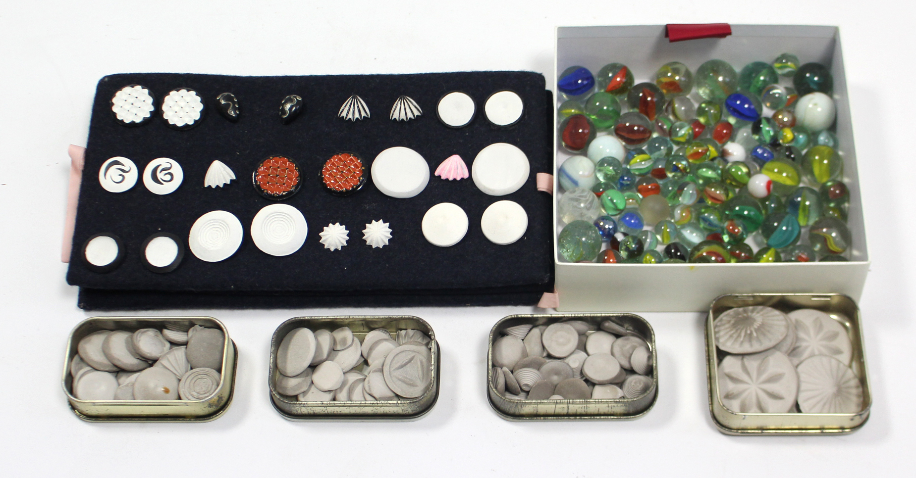 A collection of hand-made earrings; & various glass & china marbles.