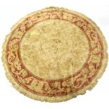 An Aubusson-style circular rug, 79” diam; & two Persian pattern rugs.