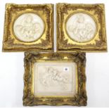 Three white composition plaques, each depicting cherubs & in gilt frames, (slight faults).