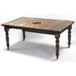 A late Victorian walnut extending dining table, with moulded edge & rounded corners to the