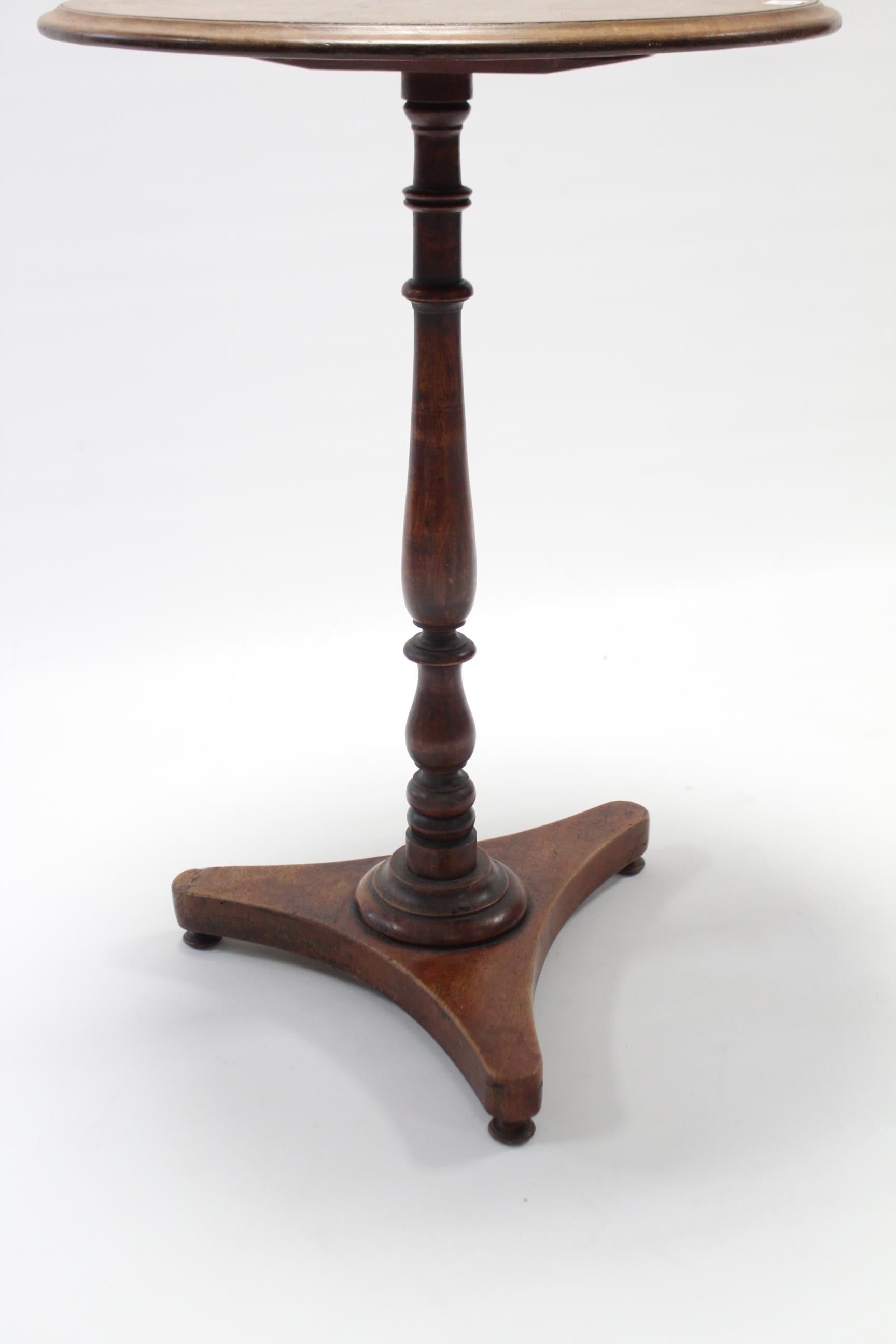 A 19th century mahogany tripod table with circular top, & on vase-turned centre column & triform - Image 2 of 2