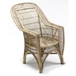 A wicker conservatory armchair.