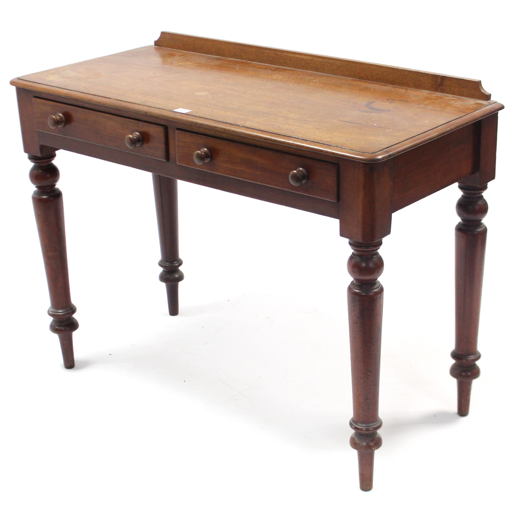 A Victorian mahogany side table fitted two frieze drawers, & on turned tapered legs, 40½” wide.