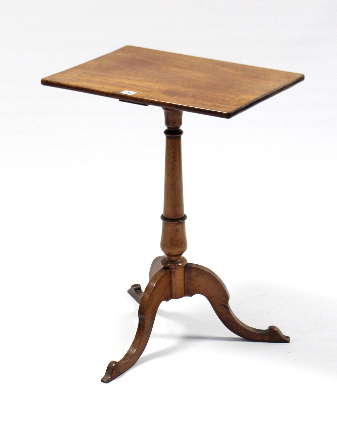 A 19th century mahogany tripod table with rectangular top, & on vase-turned centre column & three