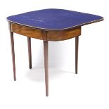 A Regency figured mahogany card table, the rectangular fold-over top with wide crossbanding &