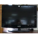A Samsung 26” HD-Ready TV in black-finish case.