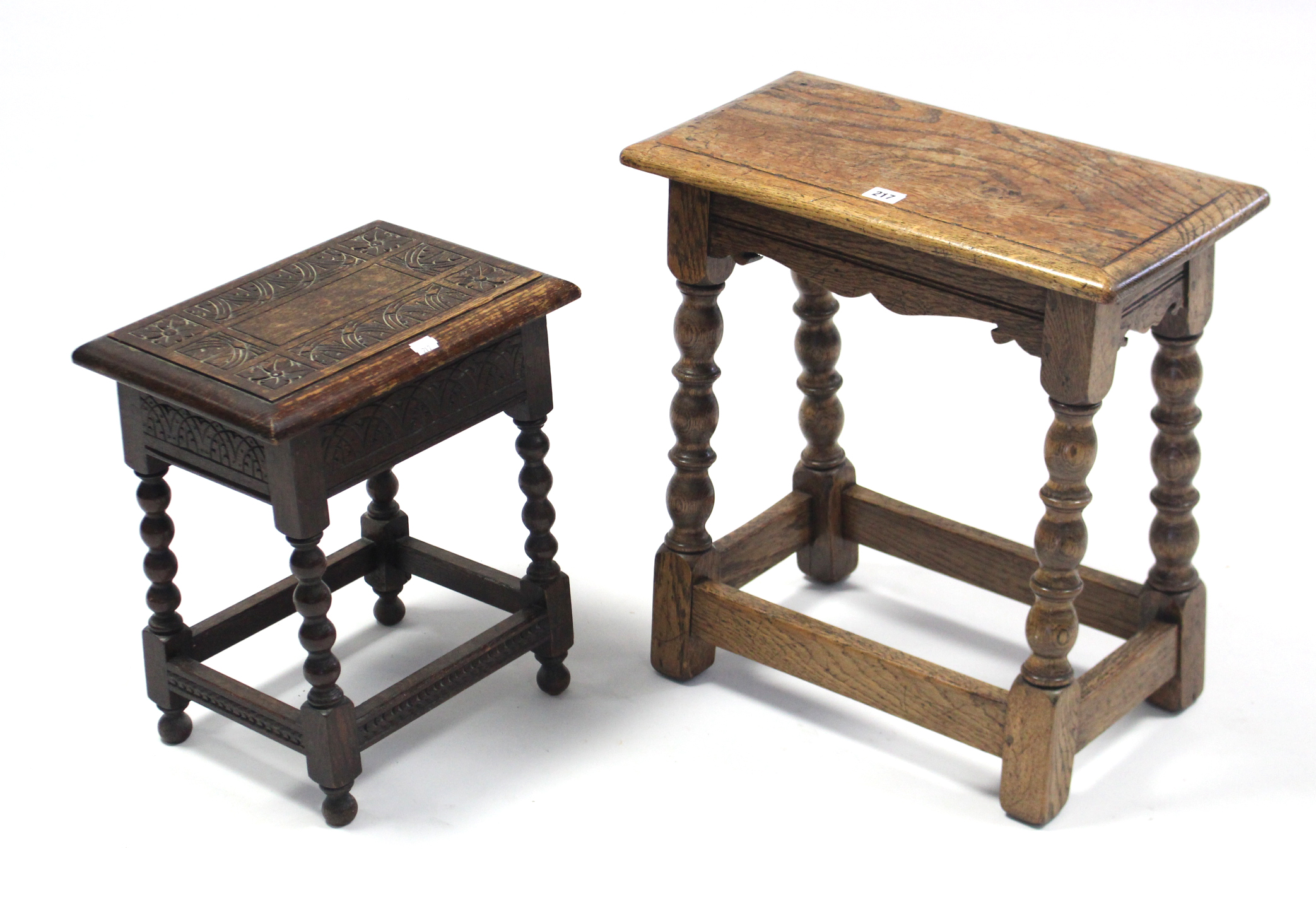 An oak joint stool with moulded edge to the rectangular top, & on turned supports with plain