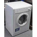 An Indesit 7kg tumble-dryer in white-finish case.
