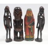 An eastern painted & carved wooden figure “Fukurokoju”, 17½” high; & three African Carved wooden