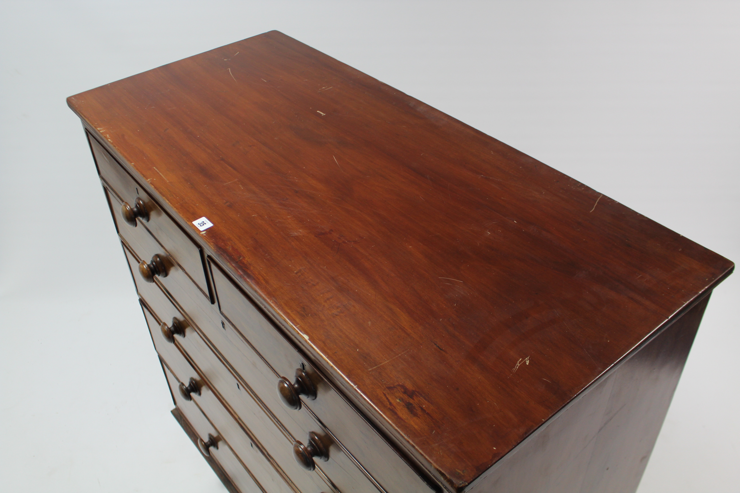 A 19th century mahogany chest fitted two short & four long graduated drawers with turned knob - Image 4 of 5