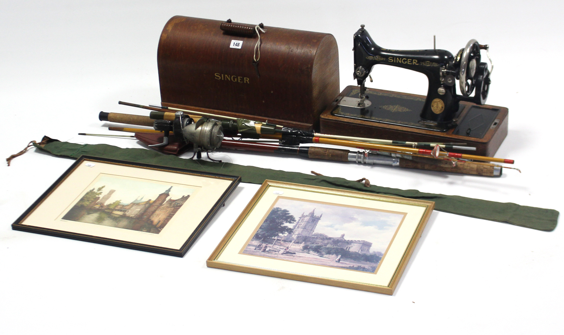 A Singer hand sewing machine with oak carrying case; together with two coloured prints; & three