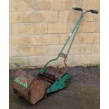 A ‘WEBB’ child’s toy push-along mower, with grass box, worn paintwork.