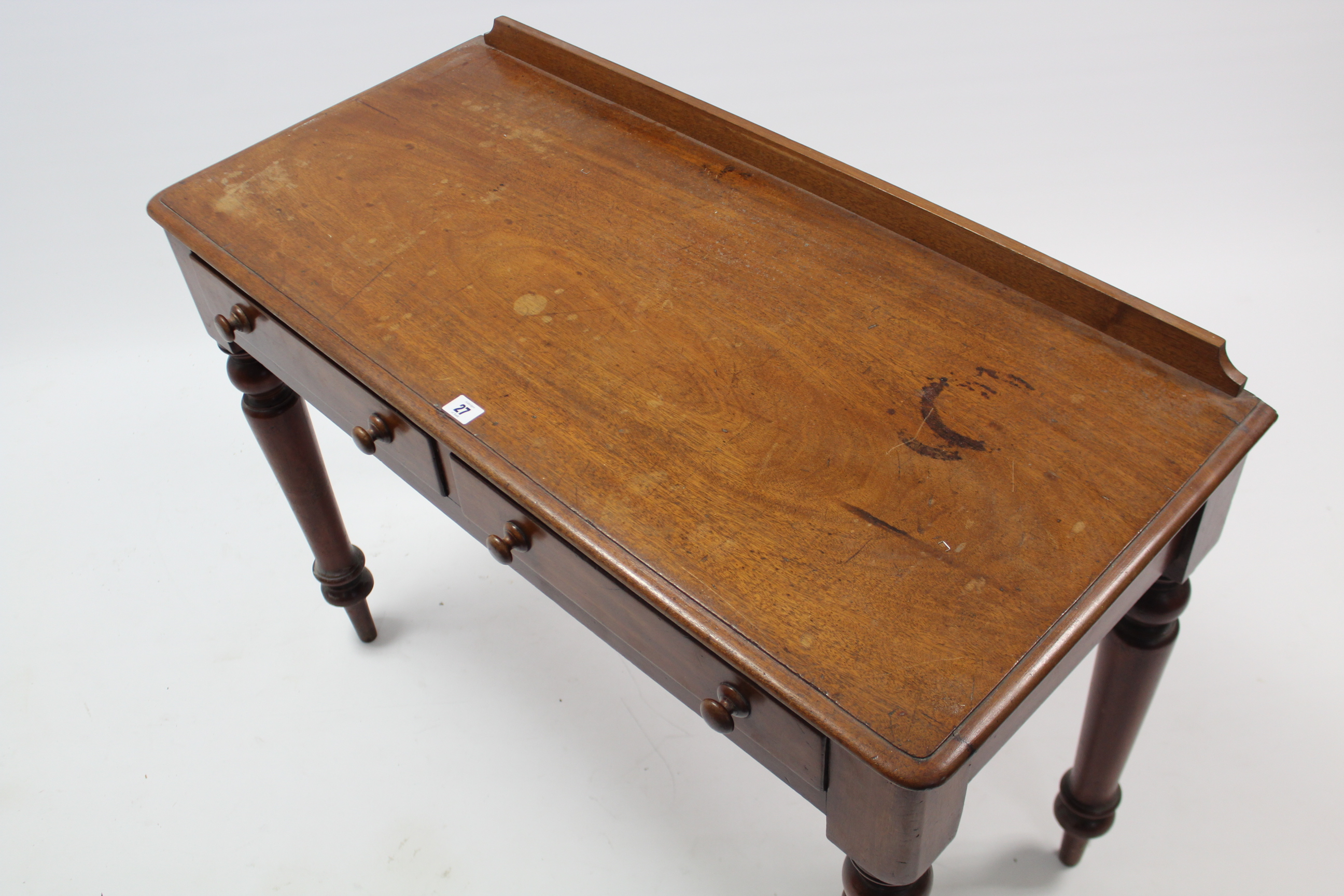 A Victorian mahogany side table fitted two frieze drawers, & on turned tapered legs, 40½” wide. - Image 3 of 3