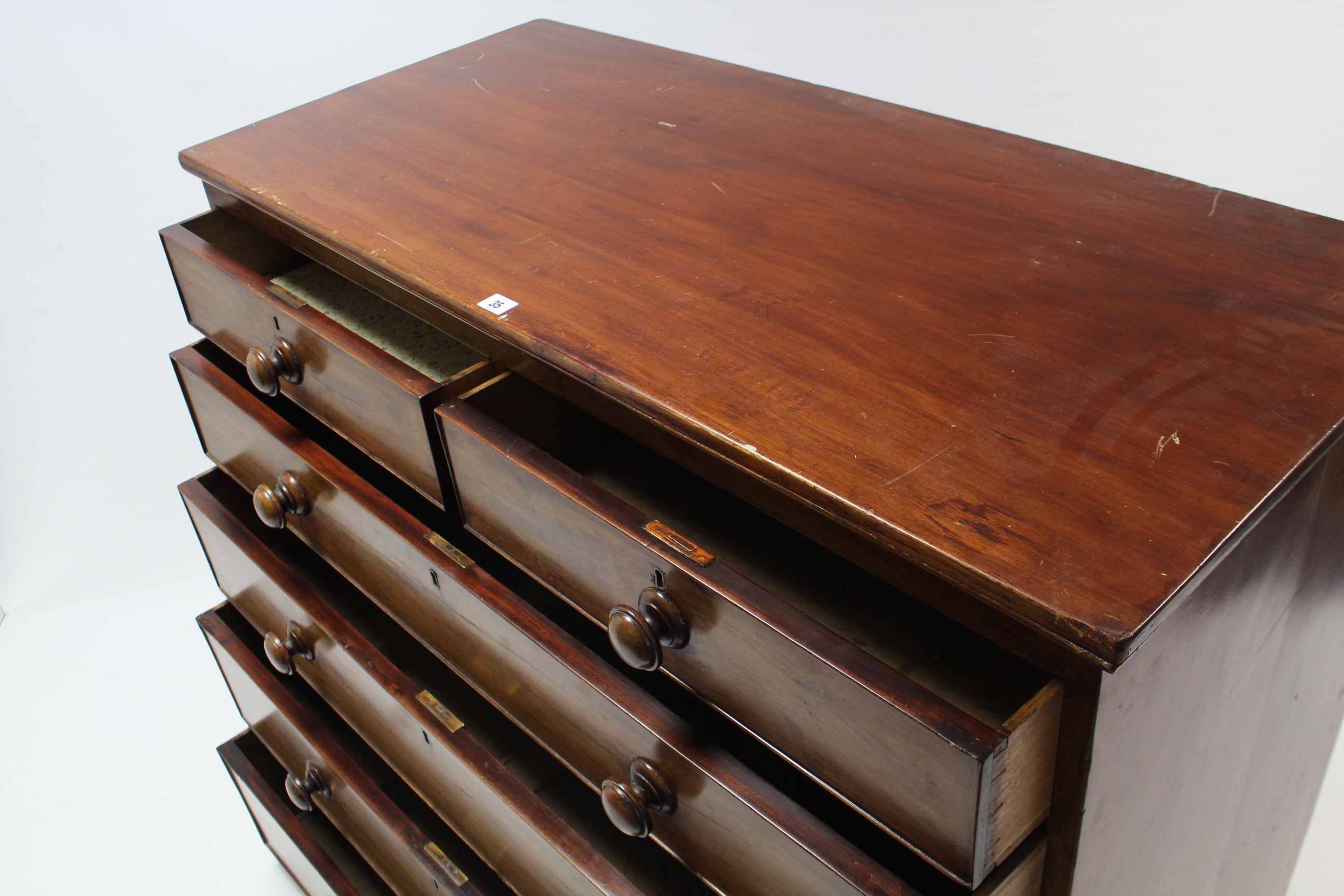 A 19th century mahogany chest fitted two short & four long graduated drawers with turned knob - Image 3 of 5