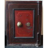 A John Port of Manchester crimson & black painted iron safe, 20” wide x 26” high x 20” deep, with