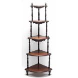 A 19th century mahogany five-tier corner whatnot with baluster-turned supports & on turned feet,
