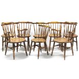 A set of eight spindle-back dining chairs (including a pair of carvers) with hard circular
