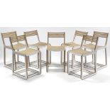 A set of seven “Skandi” white-finish rail-back dining chairs with hard seats, & on square legs