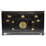 A Chinese black-lacquered hardwood sideboard, fitted three frieze drawers above a cupboard