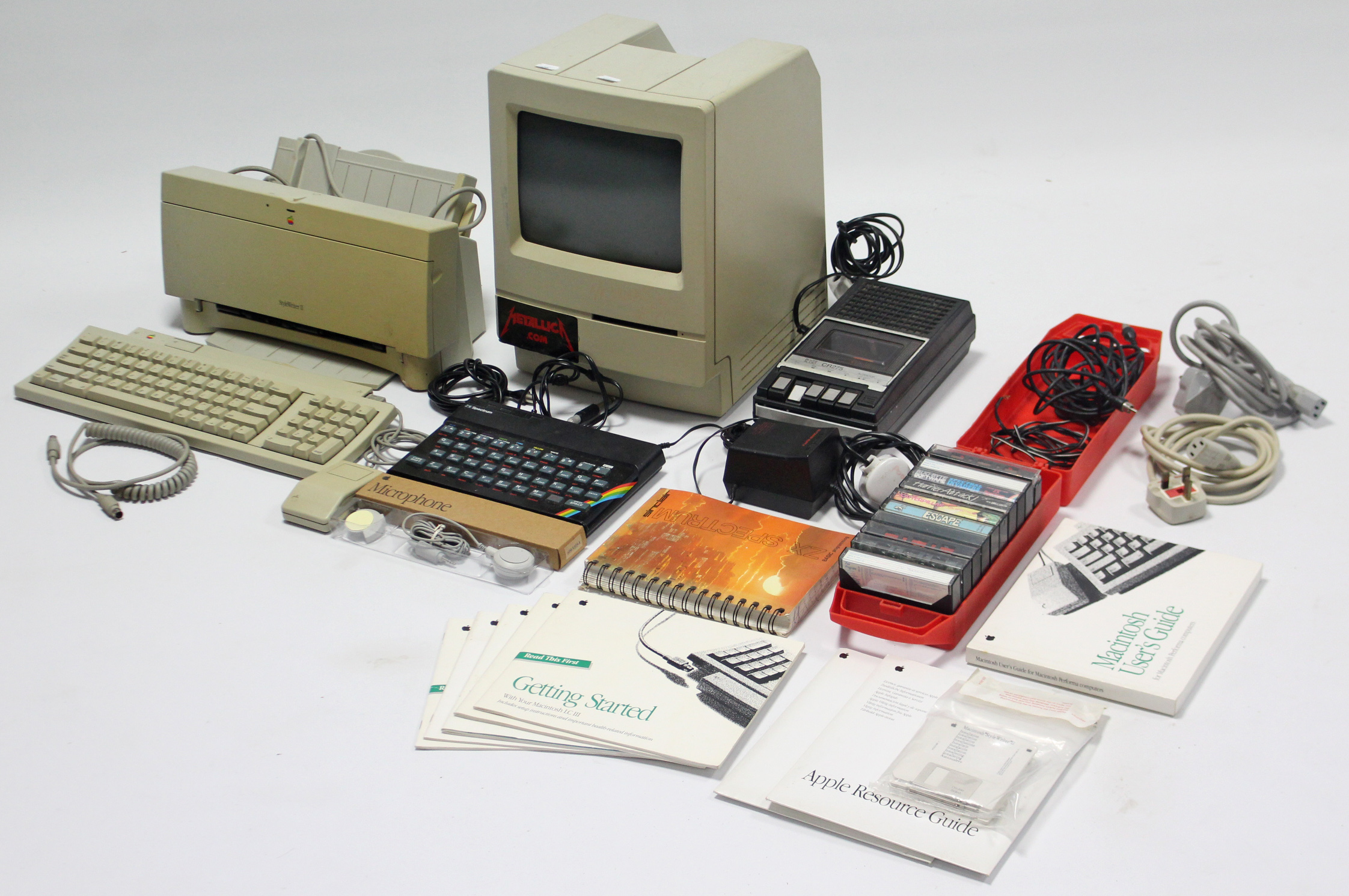 A Sinclair “2 x Spectrum” computer, various ditto accessories, & an Apple “Stylewriter II” printer.