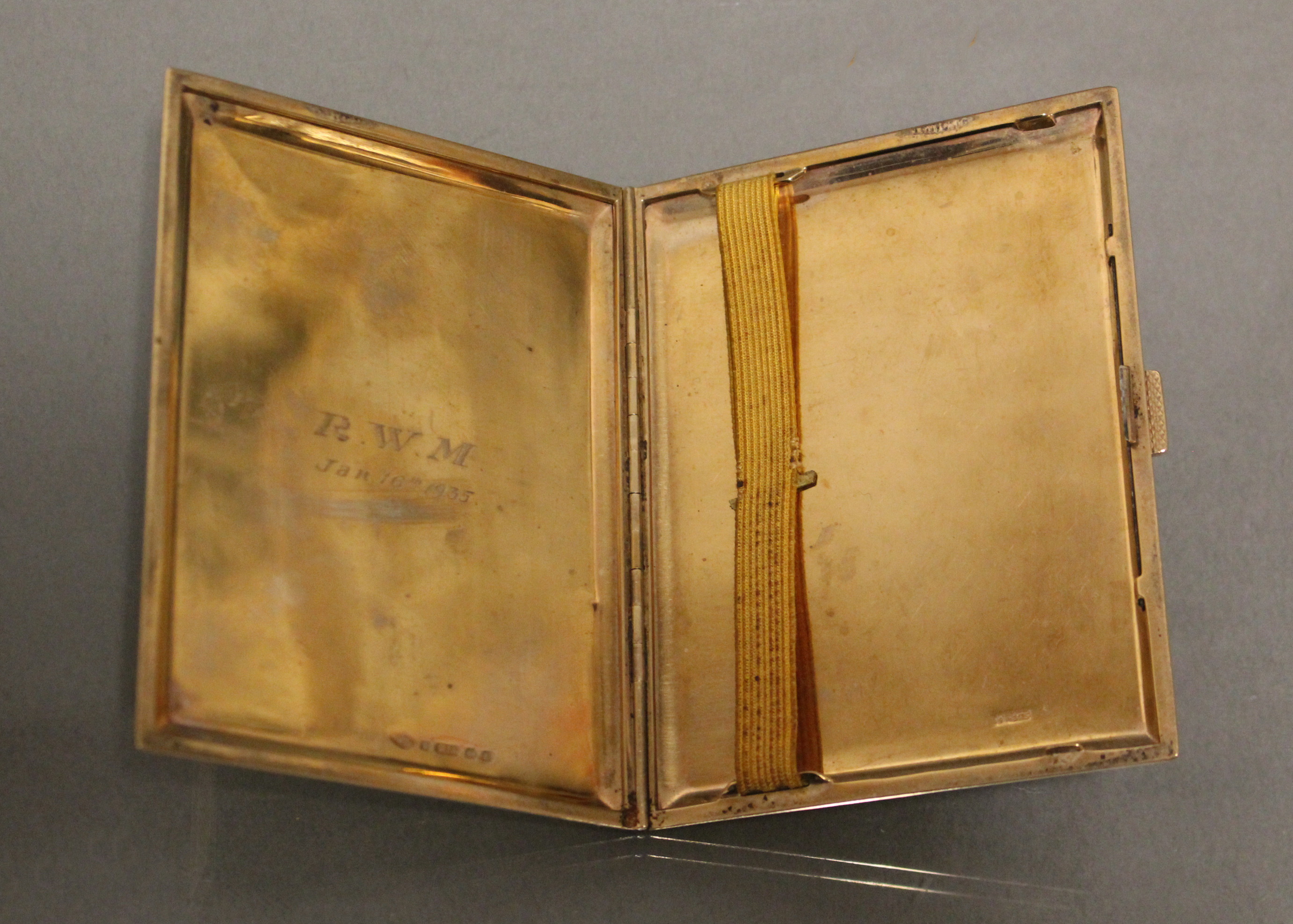 A 9ct. gold engine-turned rectangular pocket cigarette case, 4¼” x 3¼”; Birmingham hallmarks for - Image 2 of 4