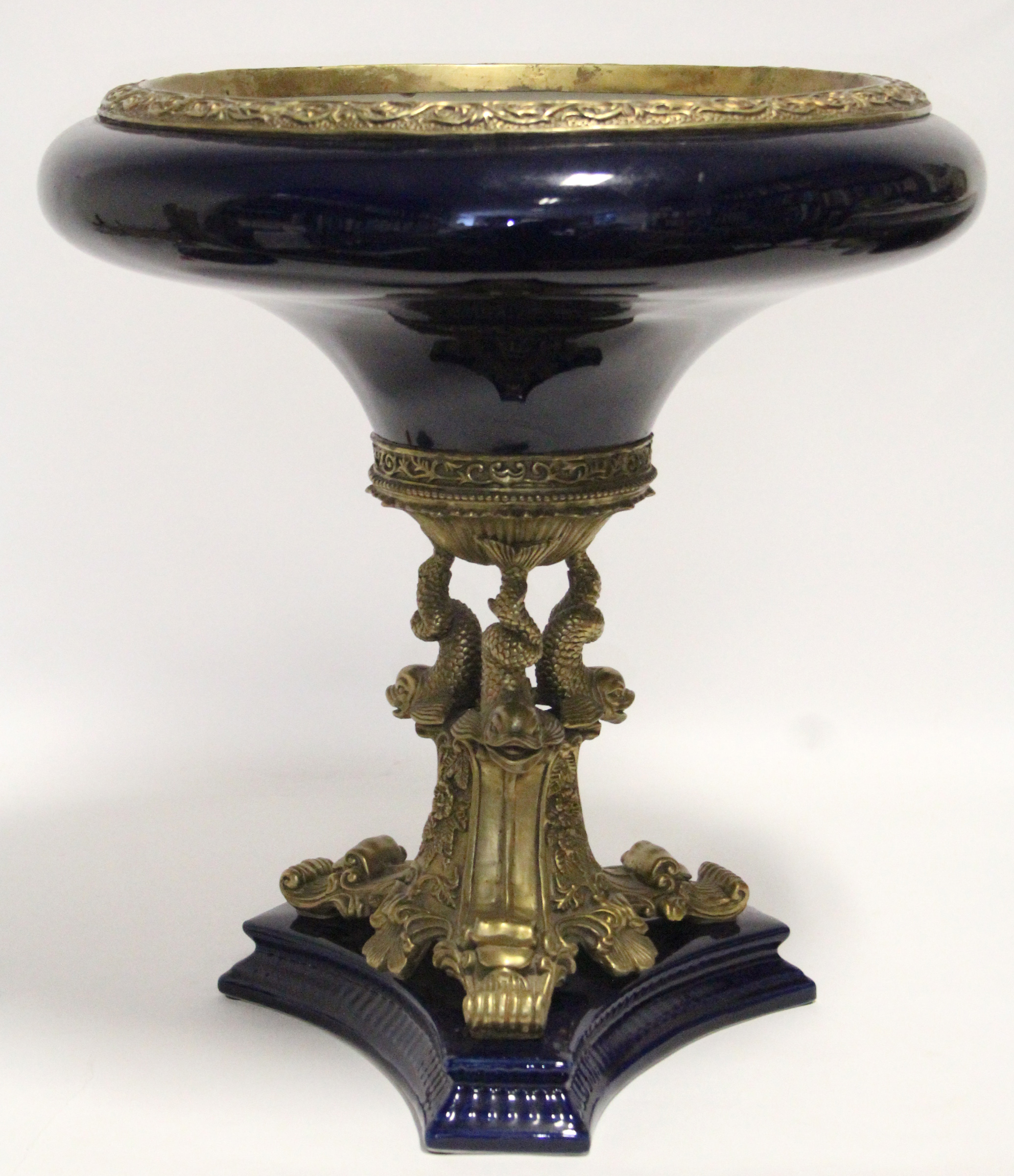 A late 19th/early 20th century continental pottery large comport with deep blue glaze & gilt metal