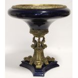 A late 19th/early 20th century continental pottery large comport with deep blue glaze & gilt metal