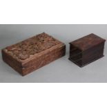 A Kashmiri carved teak rectangular box with all-over fruiting vine relief decoration, 11” wide x 3½”