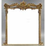 A 19th century GILT FRAME PIER GLASS, in the rococo style with foliate scroll surmount & beaded