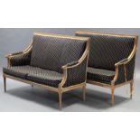 A PAIR OF LOUIS XVI STYLE BEECHWOOD FRAME SOFAS, with reeded scroll arms & fluted tapering legs,