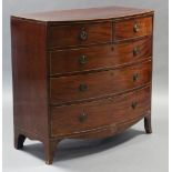 A 19th century mahogany bow-front chest of drawers, inlaid with boxwood stringing & fitted two short