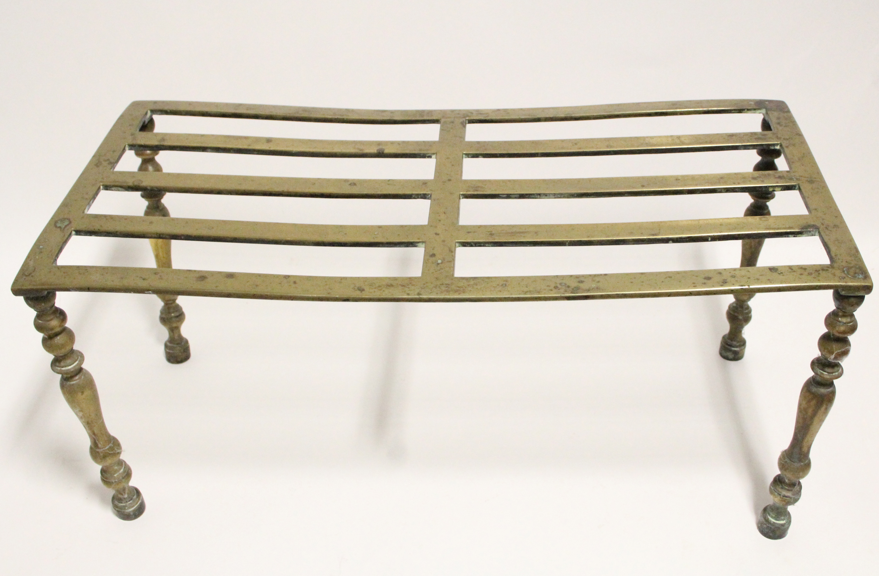 An early 19th century brass hob stand with pierced rectangular top, on slender tapered legs; 23½” - Image 2 of 2