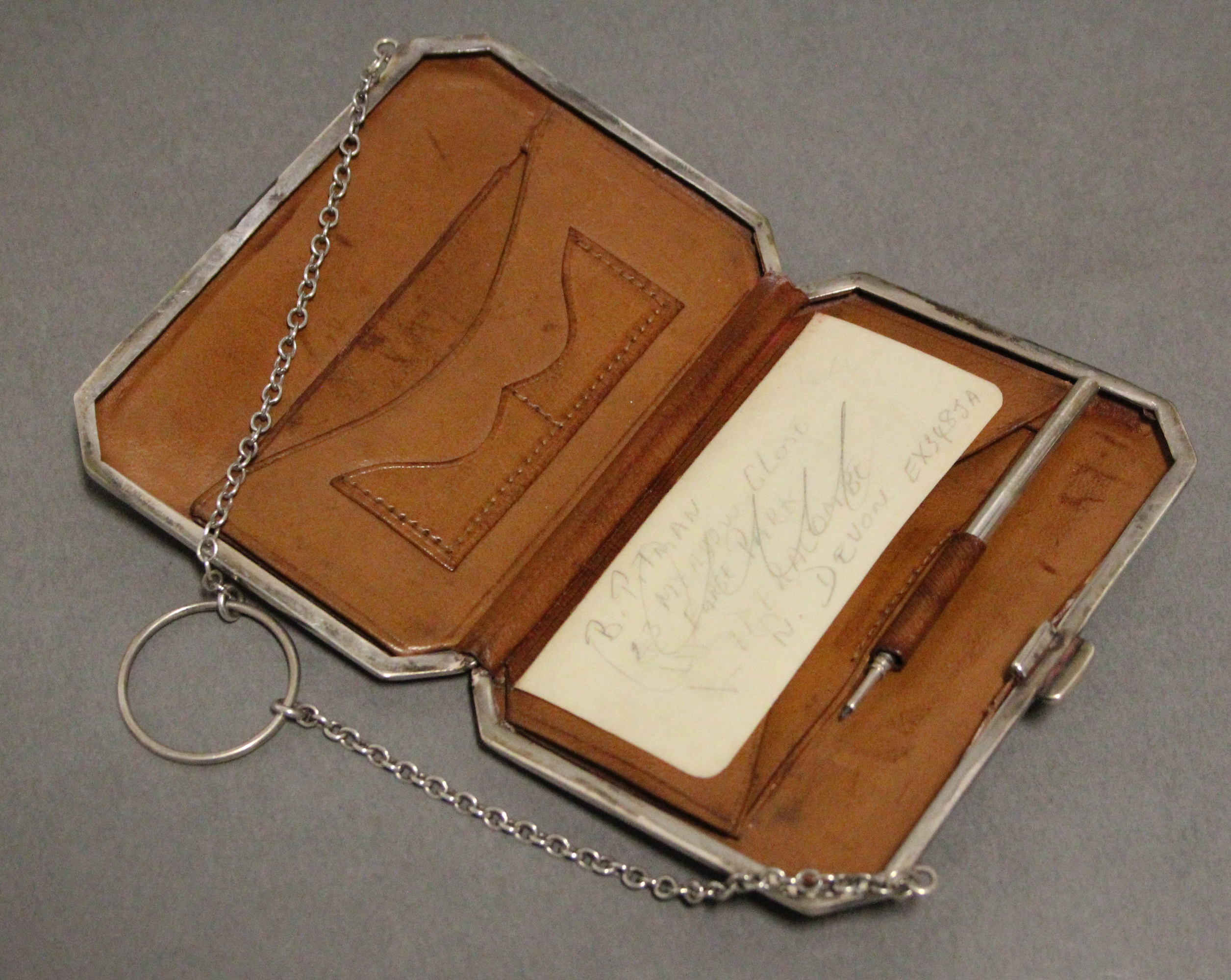 A George V engraved silver rectangular evening purse with canted corners, tan leather interior, & - Image 2 of 4