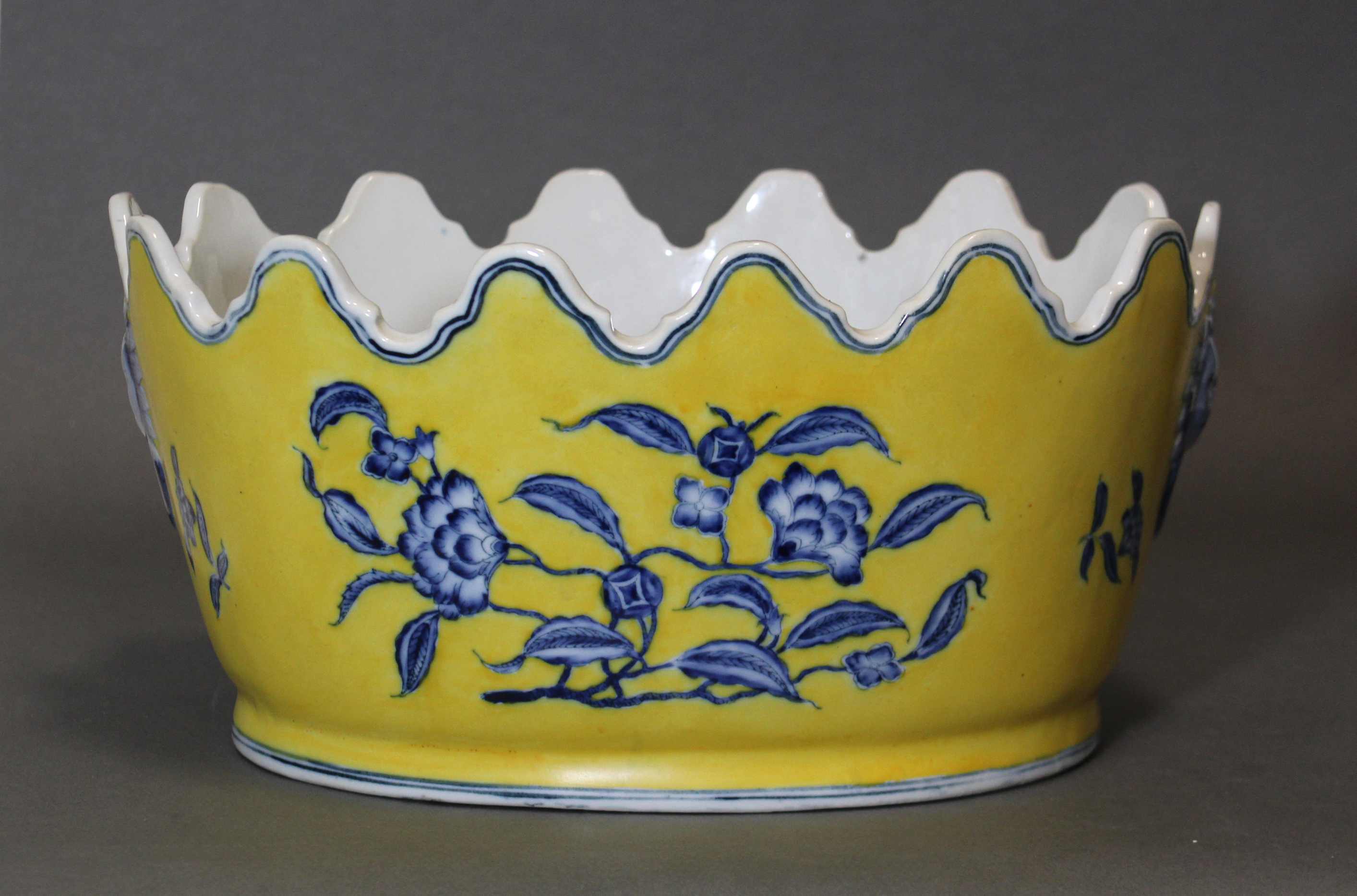 A Chinese porcelain oval jardinière of monteith shape, with underglaze blue decoration on a yellow - Image 2 of 5