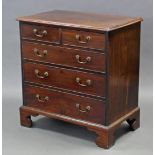 A George III mahogany chest, with moulded edge, fitted two short & three long graduated oak lined