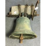 A 19th century BRONZE BELL cast by I. Warner & Sons, London, dated 1873, with clapper & iron