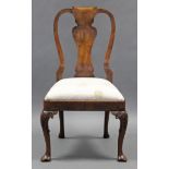 A George I style walnut dining chair with shaped splat back, padded drop-in seat & carved cabriole