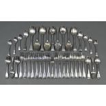 Sixteen continental Fiddle pattern table forks; a ditto dessert fork; eight ditto table spoons;