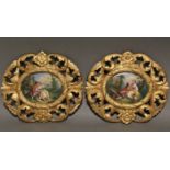 A pair of mid-19th century continental porcelain oval plaques, each finely painted in coloured