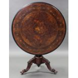 A mid-Victorian figured walnut loo table with floral marquetry decoration to the circular top, on