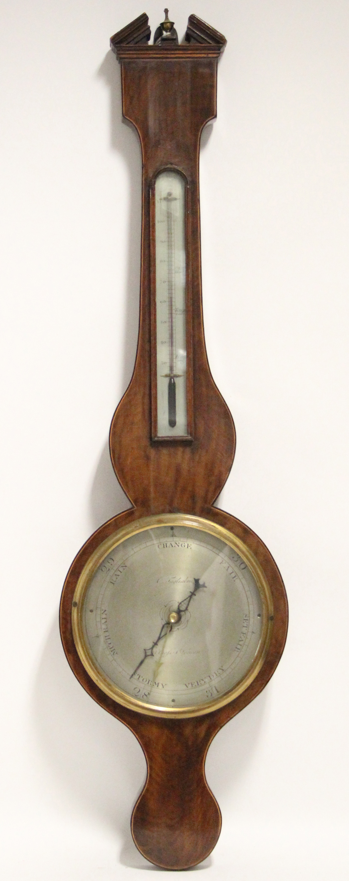 A George III banjo barometer, the 8¼” silvered dial signed: “C. Tagliabue, 28, Crofts St.,