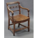 An early-mid 19th century ash & elm “Mendlesham” type elbow chair with hollow seat, square tapered