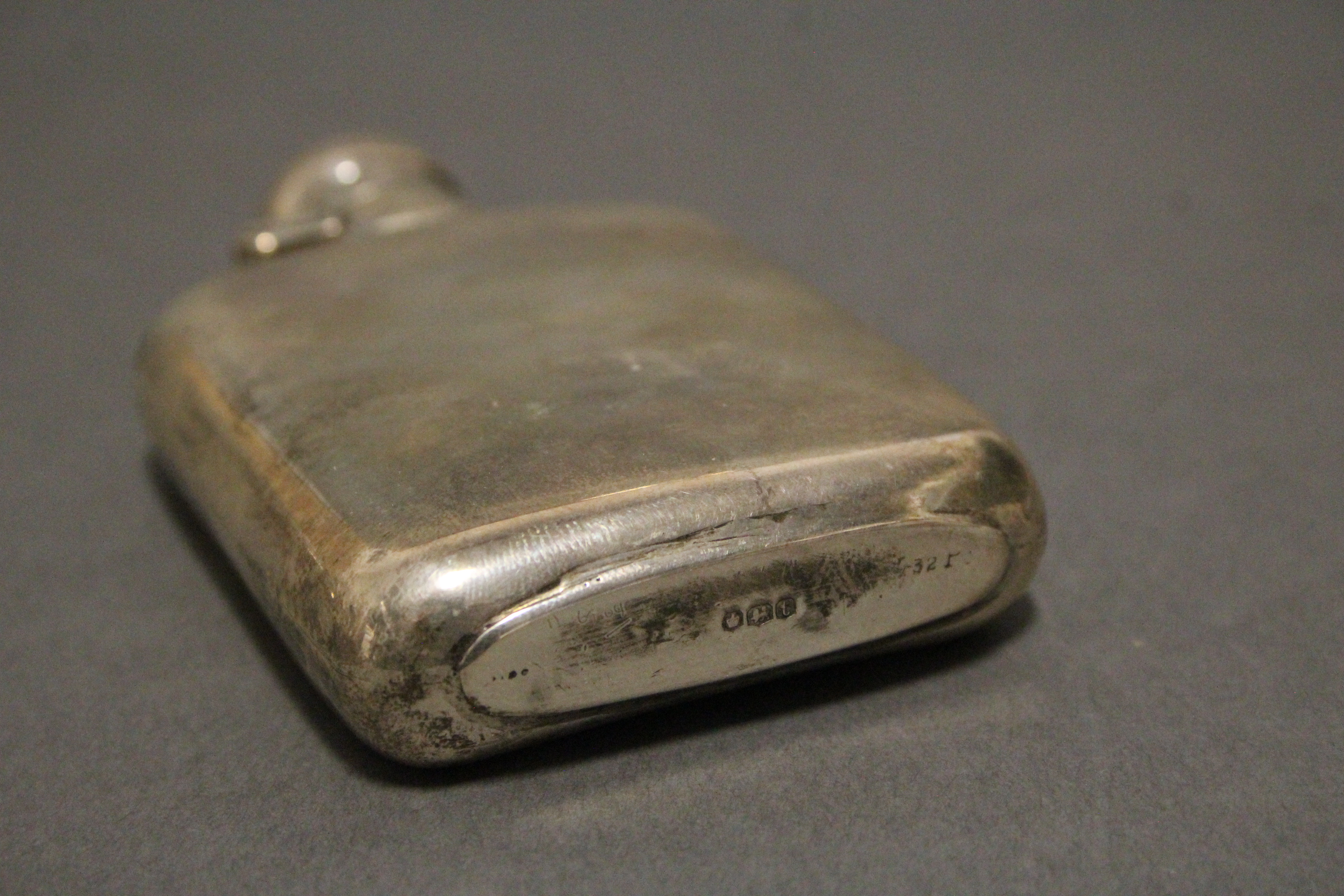 A George V silver plain rectangular pocket spirit flask with hinged ball cap, 3¾” high; Sheffield - Image 3 of 3