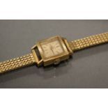 A Tudor ladies’ wristwatch, the square champagne dial with gold baton numerals, 17 jewel movement,