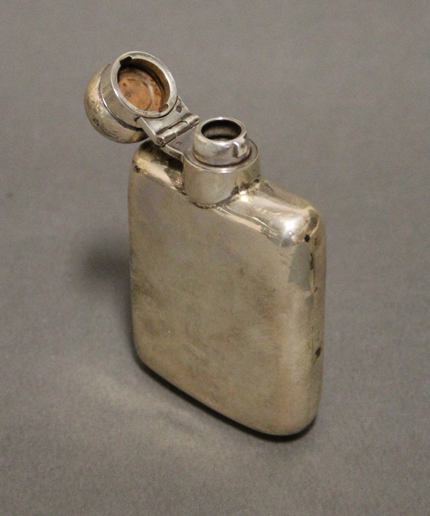 A George V silver plain rectangular pocket spirit flask with hinged ball cap, 3¾” high; Sheffield - Image 2 of 3