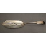 An Irish George III silver Fiddle pattern fish slice with pierced & engraved scimitar blade;