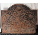 A 17th century cast-iron fireback with arched top & decorated with the Boscobel Oak flanked by