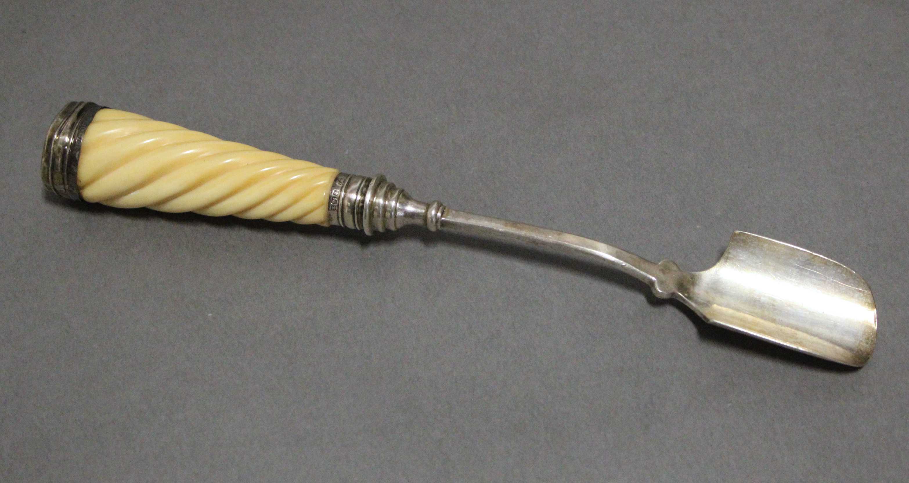 An Edwardian silver cheese scoop with spiral-fluted ivory handle, 9¼” long; London 1906 b Goldsmiths