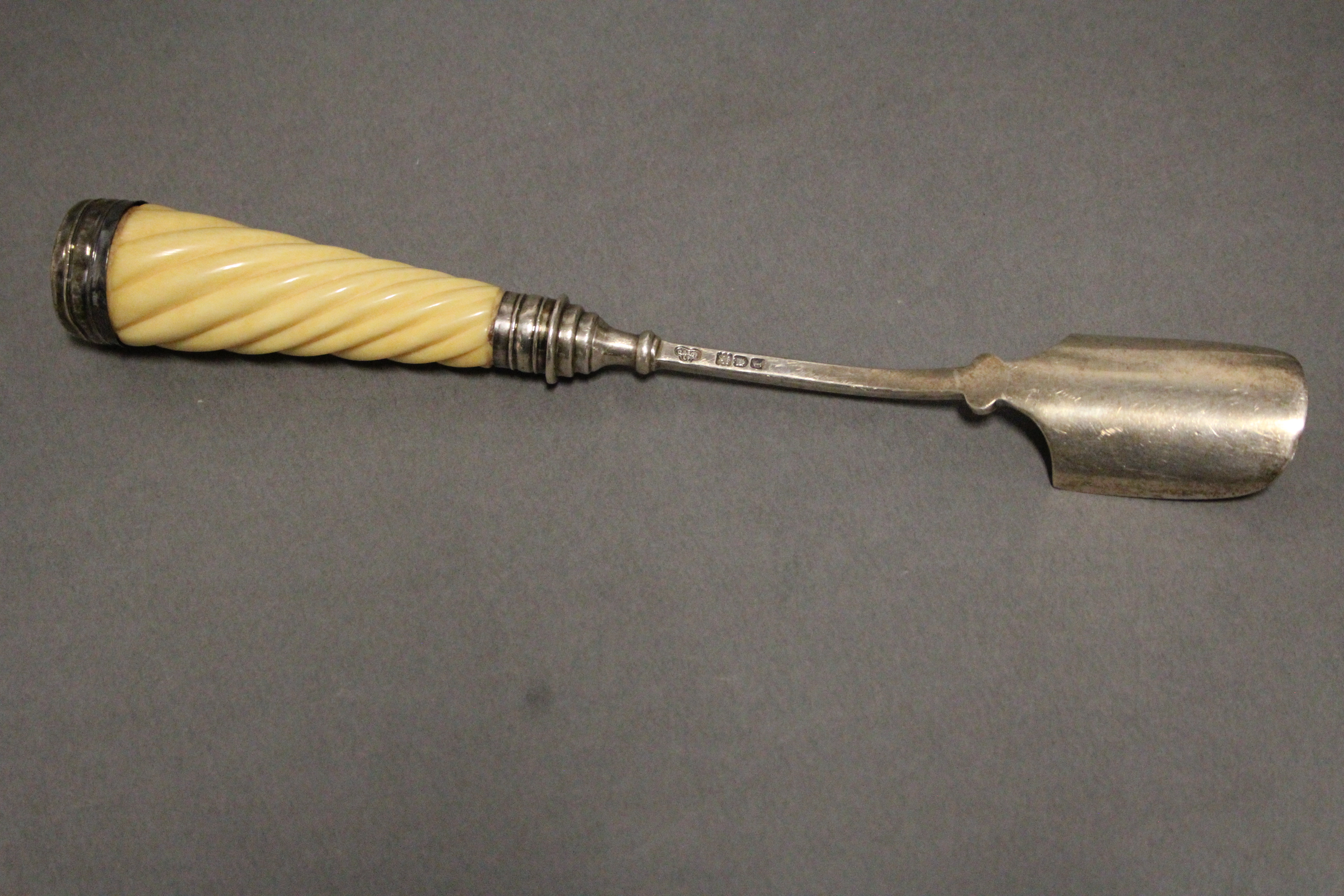 An Edwardian silver cheese scoop with spiral-fluted ivory handle, 9¼” long; London 1906 b Goldsmiths - Image 2 of 2